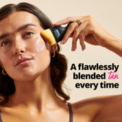 Model using Miracle Brush to apply tan to face 'A flawlessly blended tan every time'
